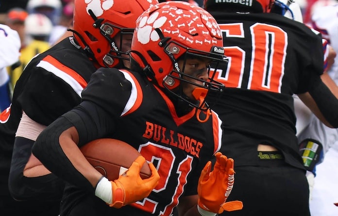 Derez Sayles (21) of Waterloo runs the ball against Cahokia in the Class 4A second round football game at Waterloo High School on Saturday, November 9, 2024. Paul Baillargeon