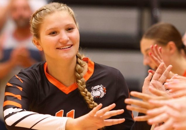 Megan Huebner (11) of Waterloo slaps hands with her team during pregame introductions against  Mater Dei at Waterloo High School on Tuesday, September 9, 2024. Paul Baillargeon