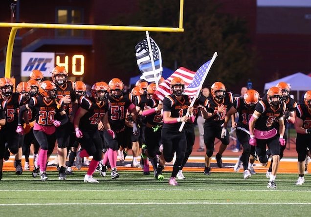 Conrad Lindhorst (1) of Waterloo leads the Bulldogs onto the field in their game against Jerseyville on Friday, October 4, 2024 at Waterloo High School. Paul Baillargeon